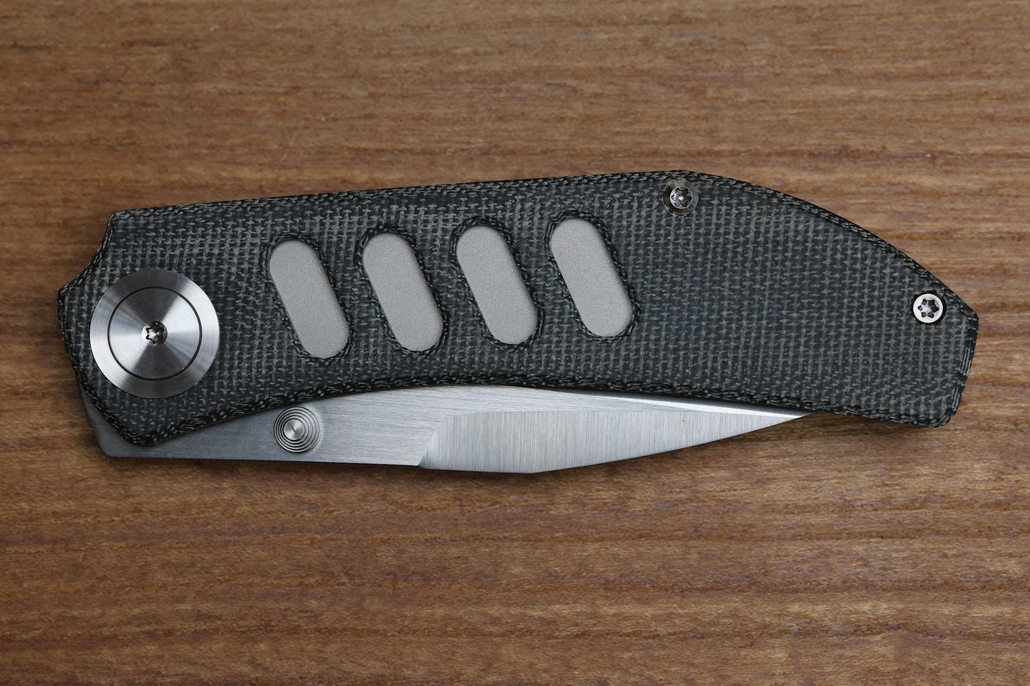 YAN’S CHEVRON- TITANIUM FRONT FLIPPER WITH BLACK MICARTA THUMB STUD