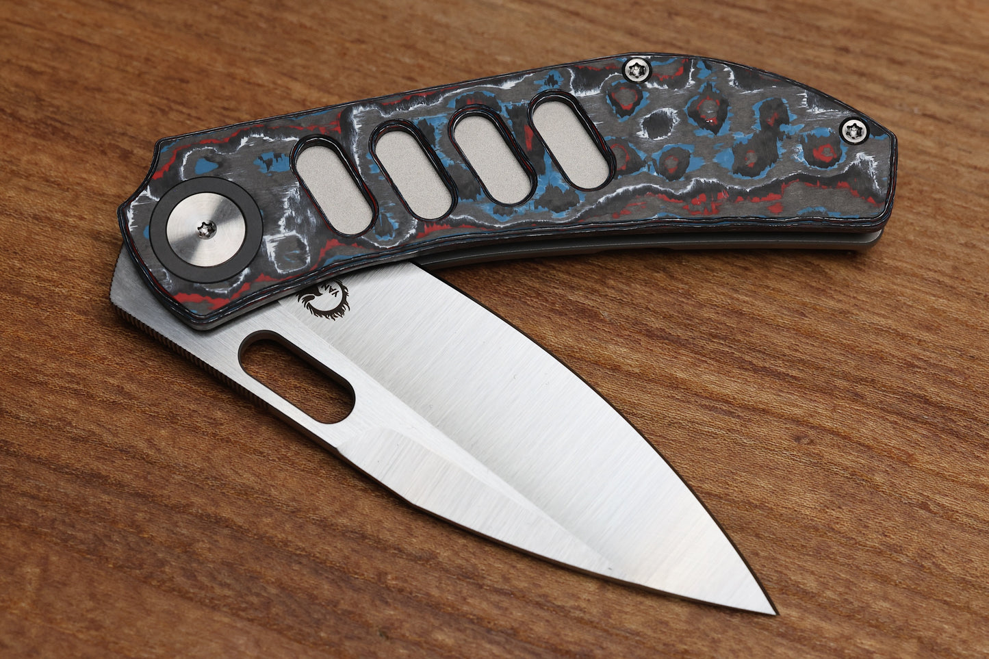 YAN’S CHEVRON- TITANIUM FRONT FLIPPER WITH NEBULA CF THUMB HOLE