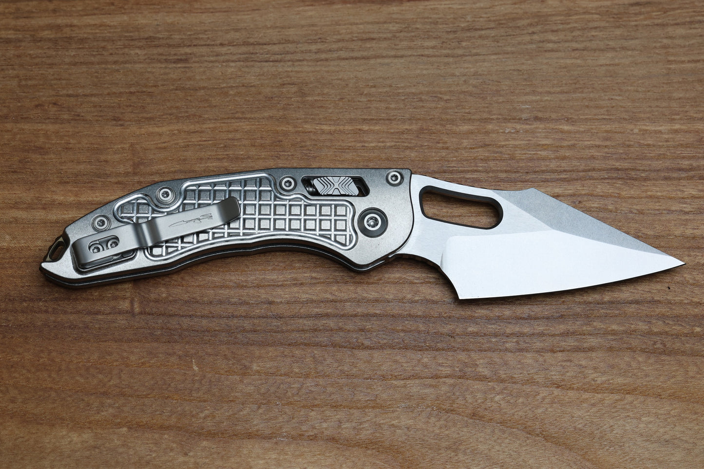 MICROTECH MARFIONE SELECT MANUAL STITCH RAM LOK FRAG TITANIUM HANDLES & STONEWASH M390MK W/ DOUBLE VAPOR BLAST & BRONZE ACCENTS 169RL-10FRMS1