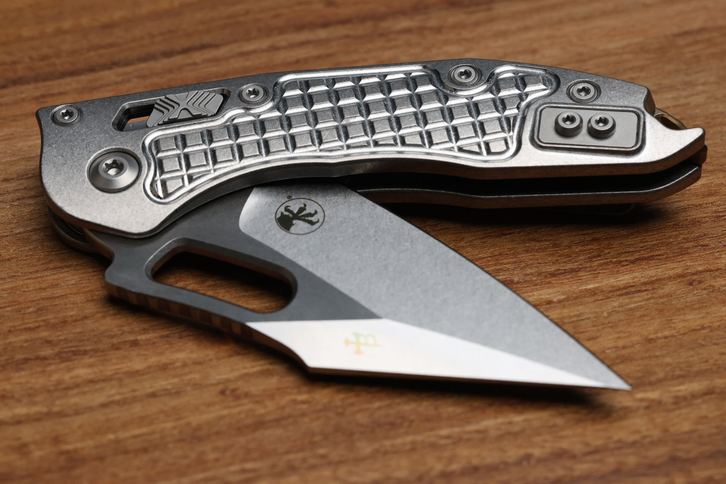 MICROTECH MARFIONE SELECT MANUAL STITCH RAM LOK FRAG TITANIUM HANDLES & STONEWASH M390MK W/ DOUBLE VAPOR BLAST & BRONZE ACCENTS 169RL-10FRMS1