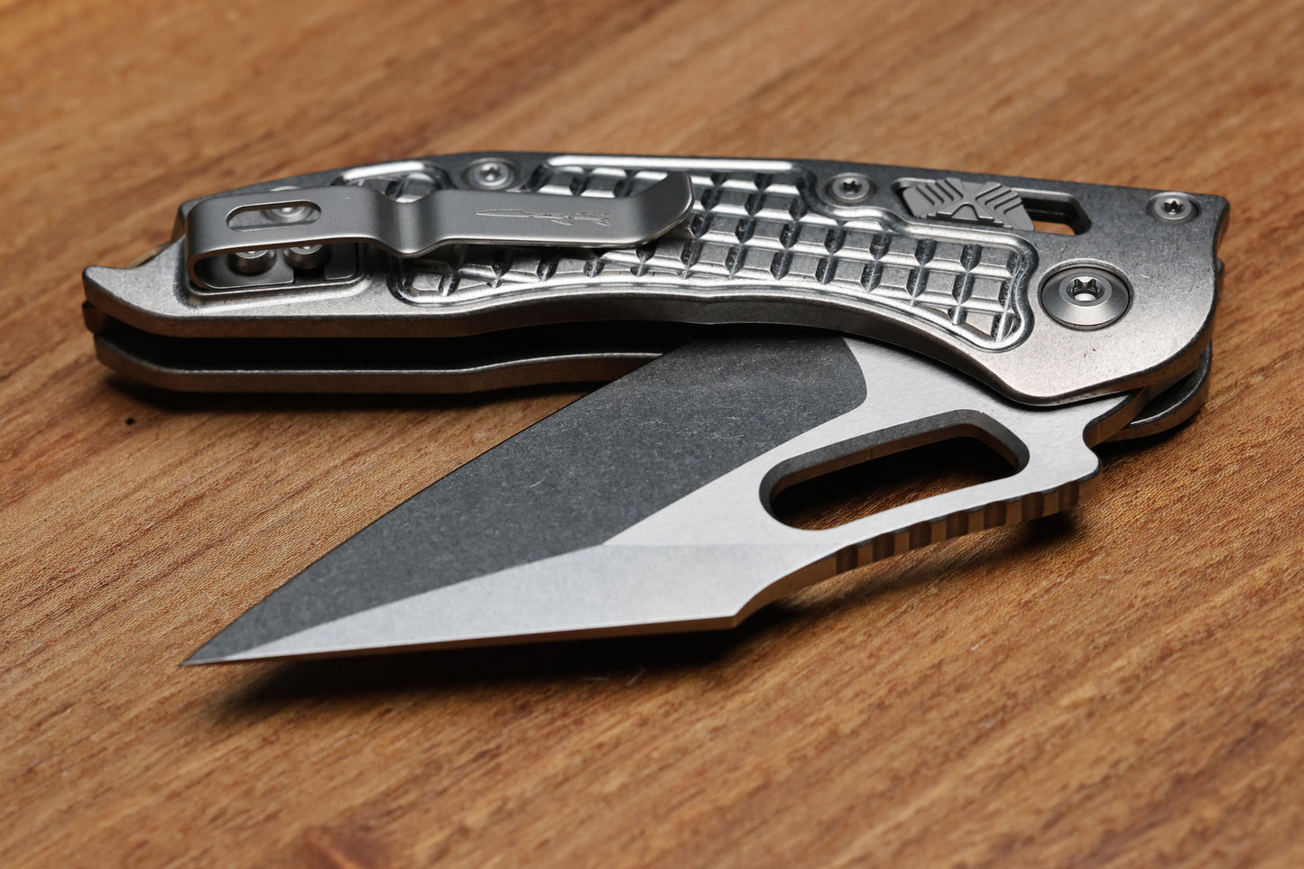 MICROTECH MARFIONE SELECT MANUAL STITCH RAM LOK FRAG TITANIUM HANDLES & STONEWASH M390MK W/ DOUBLE VAPOR BLAST & BRONZE ACCENTS 169RL-10FRMS1