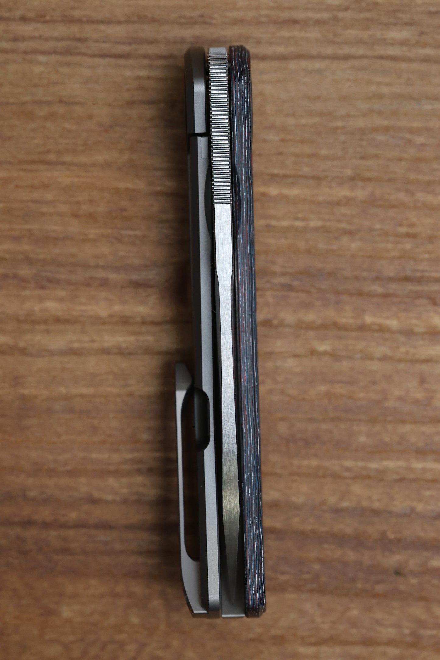 YAN’S CHEVRON- TITANIUM FRONT FLIPPER WITH NEBULA CF THUMB HOLE