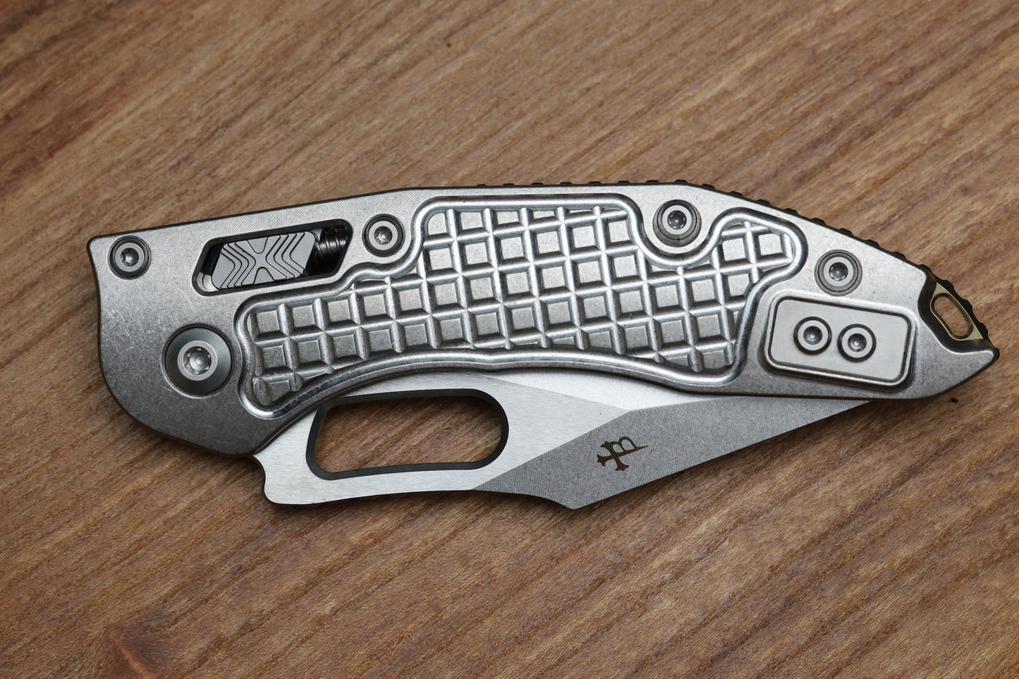 MICROTECH MARFIONE SELECT MANUAL STITCH RAM LOK FRAG TITANIUM HANDLES & STONEWASH M390MK W/ DOUBLE VAPOR BLAST & BRONZE ACCENTS 169RL-10FRMS1