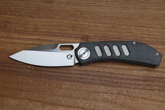 YAN’S CHEVRON- TITANIUM FRONT FLIPPER WITH BLACK MICARTA THUMB HOLE