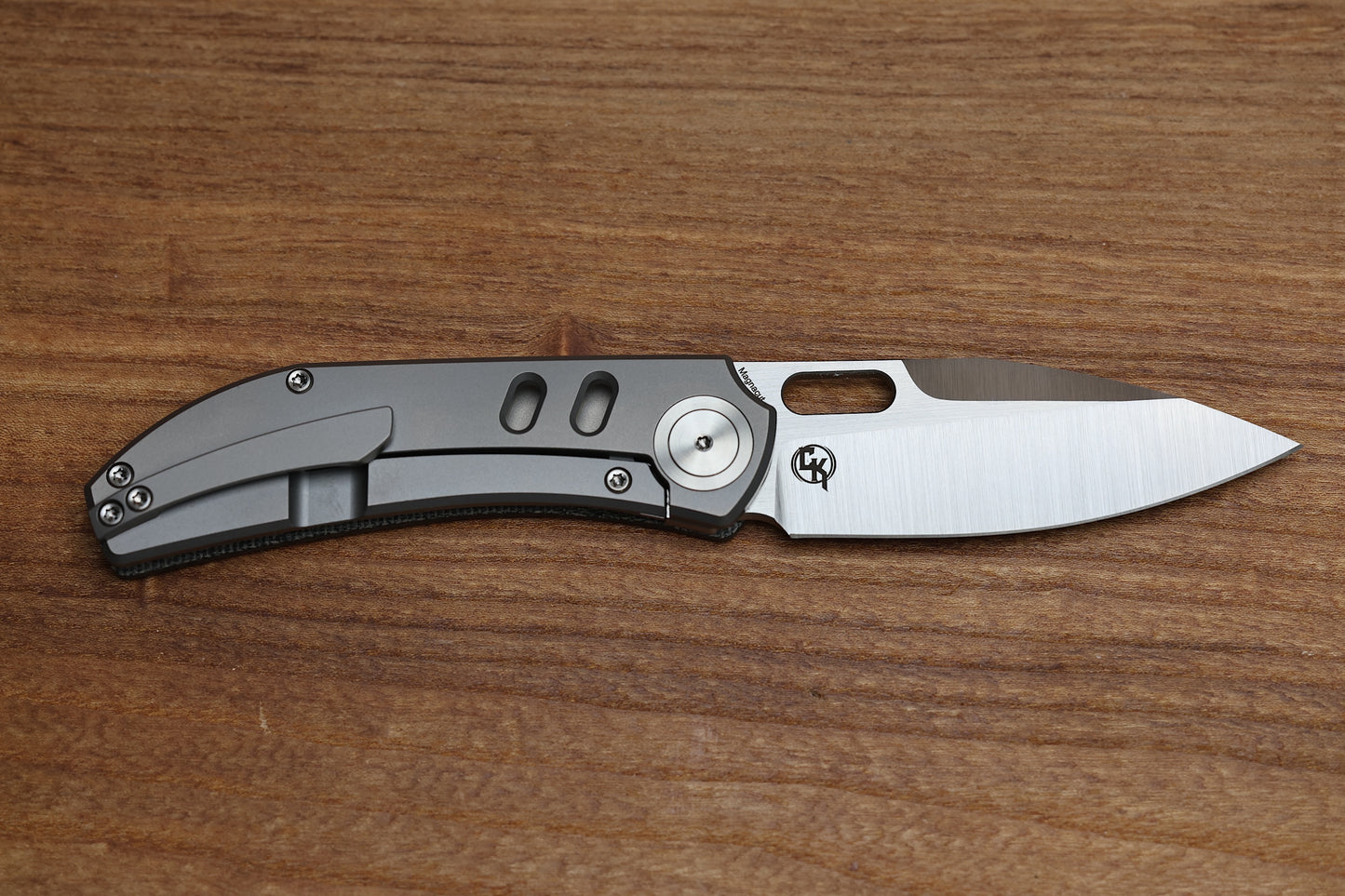 YAN’S CHEVRON- TITANIUM FRONT FLIPPER WITH BLACK MICARTA THUMB HOLE