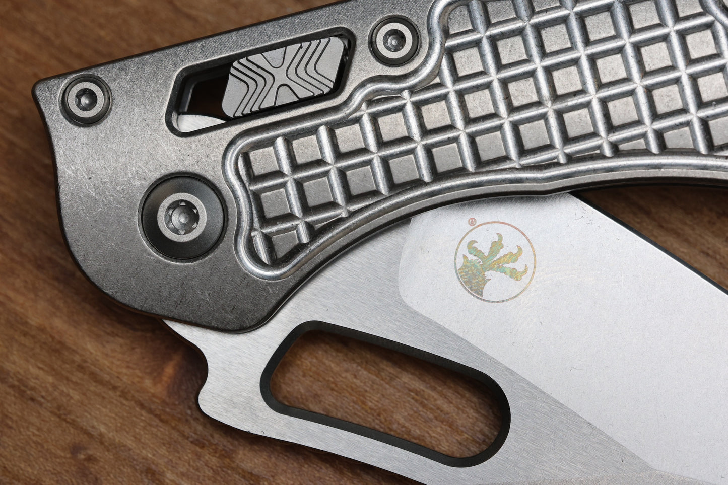 MICROTECH MARFIONE SELECT MANUAL STITCH RAM LOK FRAG TITANIUM HANDLES & STONEWASH M390MK W/ DOUBLE VAPOR BLAST & BRONZE ACCENTS 169RL-10FRMS1