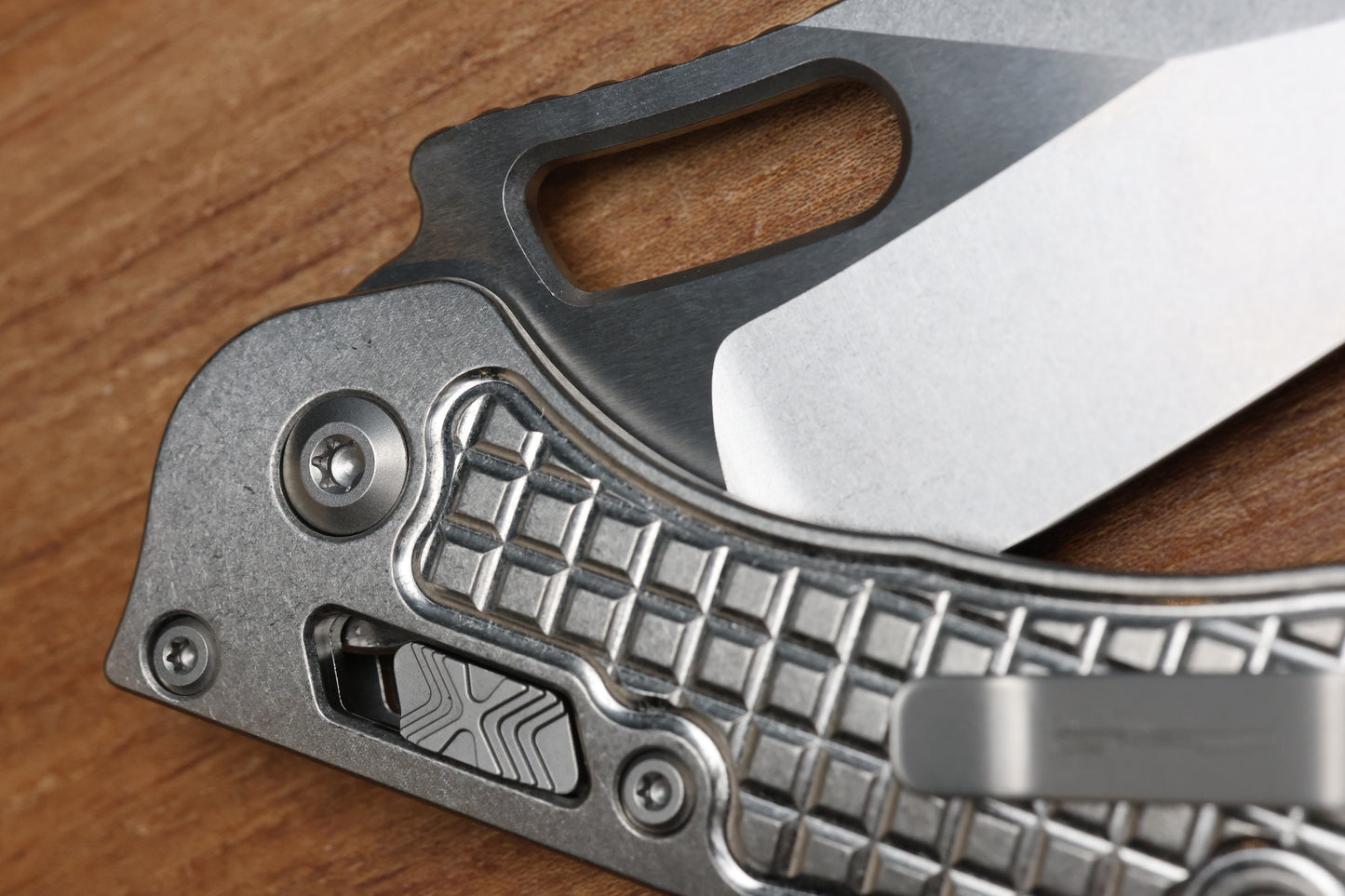 MICROTECH MARFIONE SELECT MANUAL STITCH RAM LOK FRAG TITANIUM HANDLES & STONEWASH M390MK W/ DOUBLE VAPOR BLAST & BRONZE ACCENTS 169RL-10FRMS1