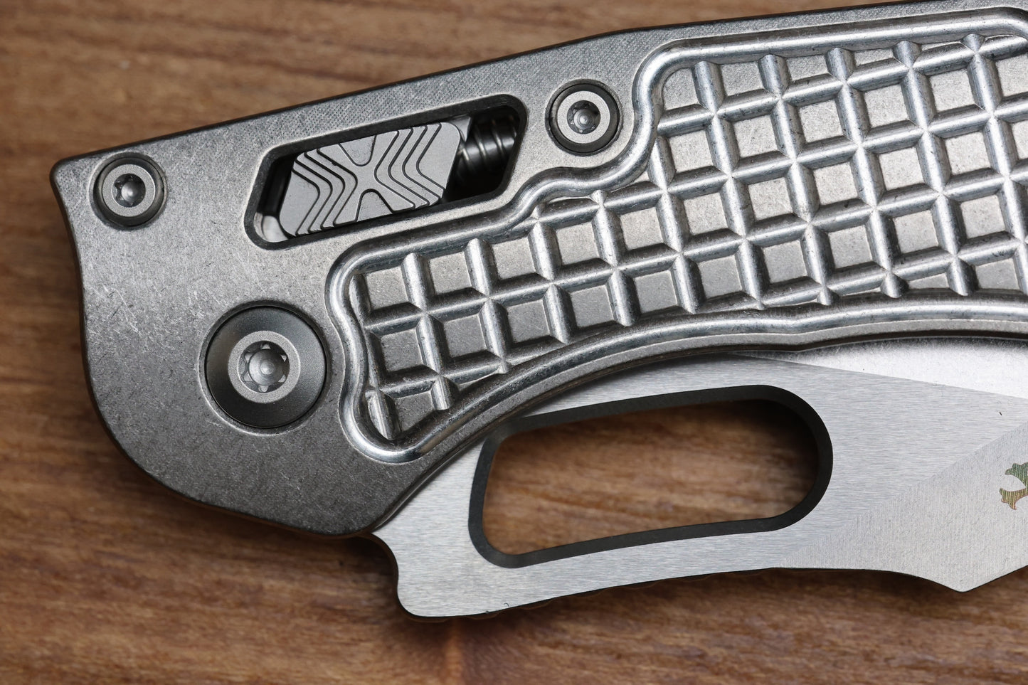 MICROTECH MARFIONE SELECT MANUAL STITCH RAM LOK FRAG TITANIUM HANDLES & STONEWASH M390MK W/ DOUBLE VAPOR BLAST & BRONZE ACCENTS 169RL-10FRMS1