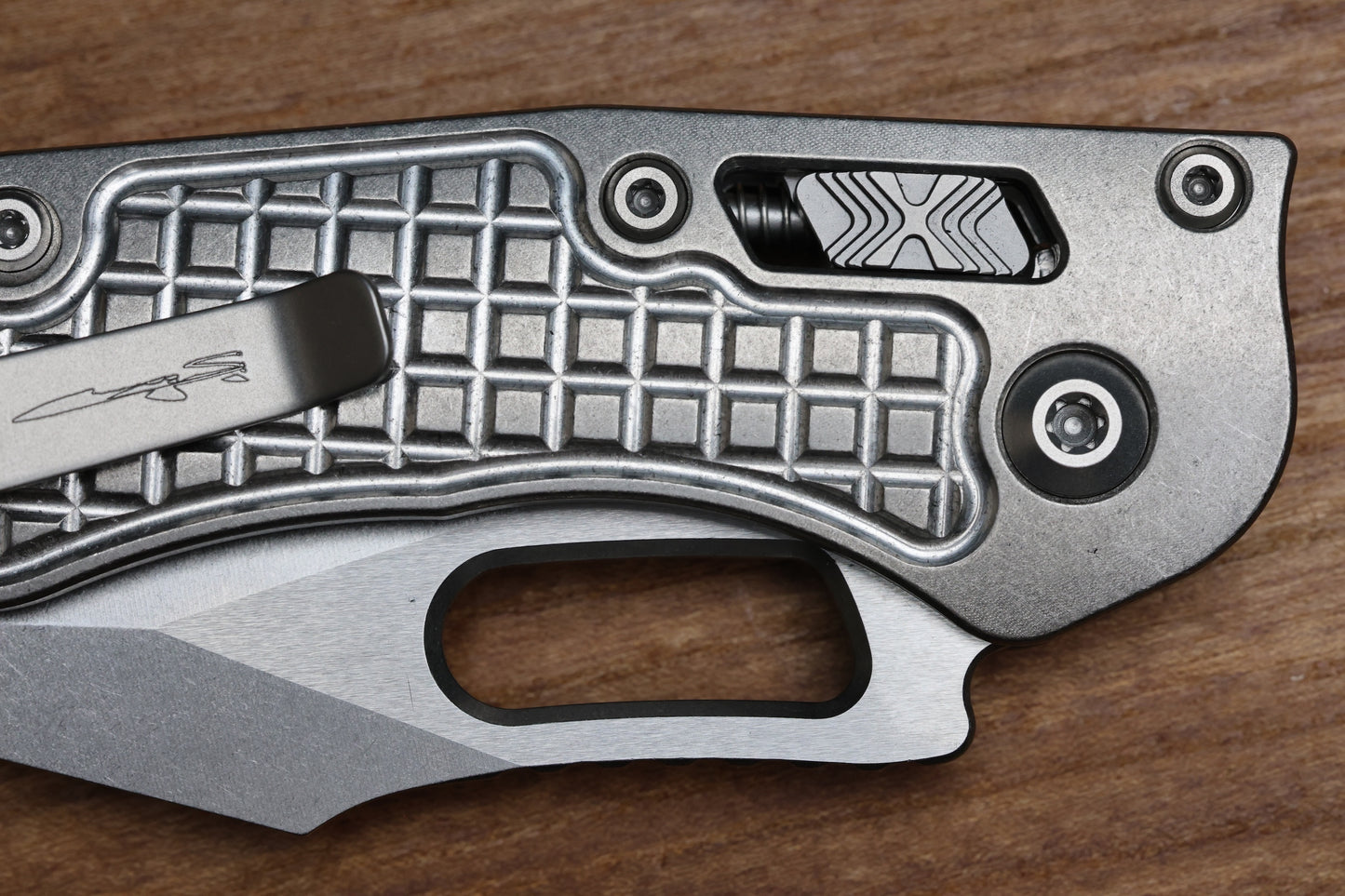 MICROTECH MARFIONE SELECT MANUAL STITCH RAM LOK FRAG TITANIUM HANDLES & STONEWASH M390MK W/ DOUBLE VAPOR BLAST & BRONZE ACCENTS 169RL-10FRMS1