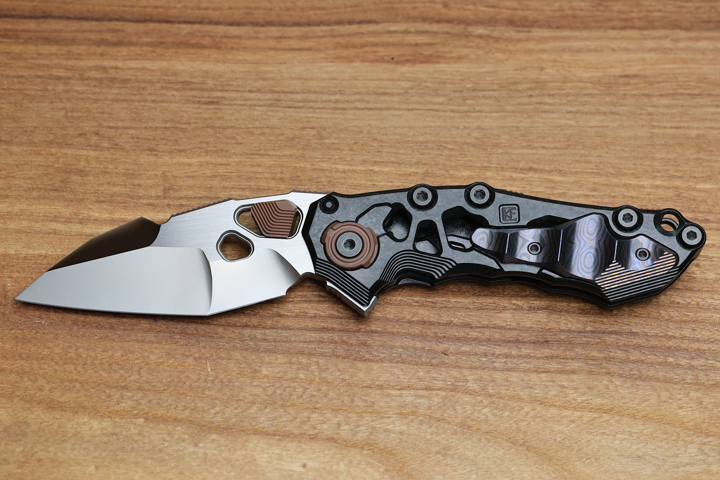 CUSTOM KNIFE FACTORY TRAKTOR CRYSTAL TI/ZIRCUTI/COPPER & TRI-TONE M390