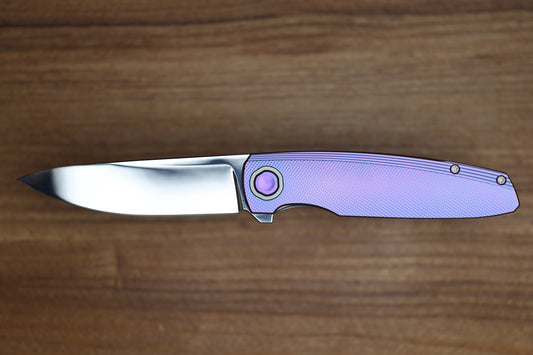 HOLT BLADEWORKS OUTLAW W/TITANIUM CHECKERED BURNISHED HANDLES & BOHLER NEAR MIRROR M390 #150 (PREOWNED)