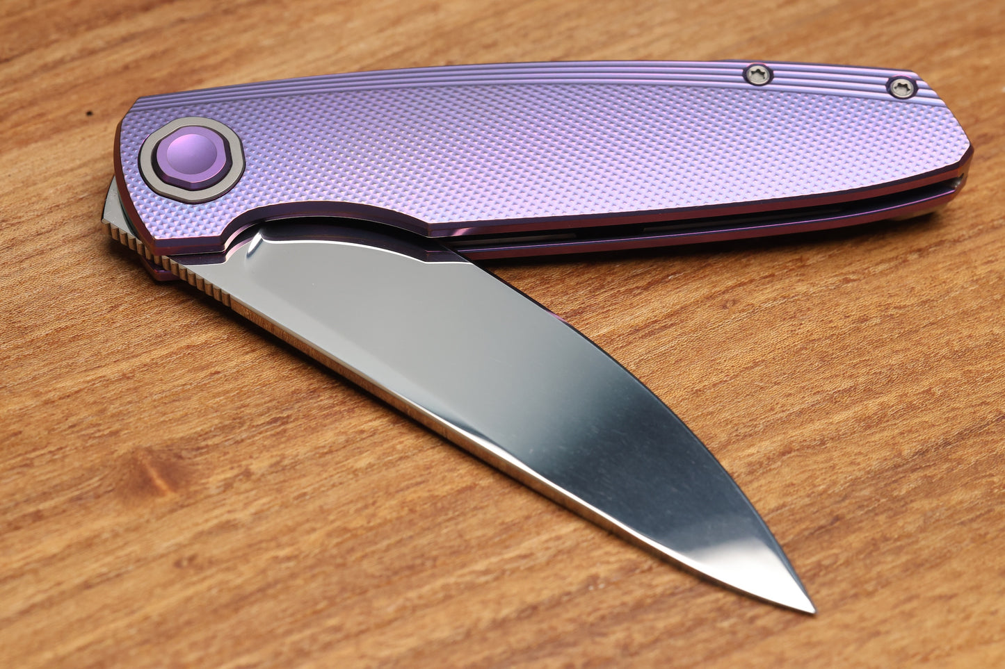 HOLT BLADEWORKS OUTLAW W/TITANIUM CHECKERED BURNISHED HANDLES & BOHLER NEAR MIRROR M390 #150 (PREOWNED)