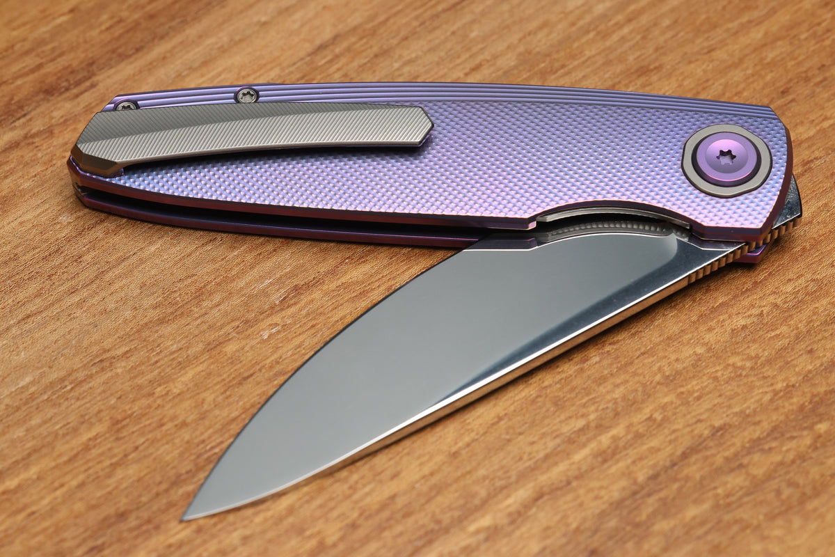 HOLT BLADEWORKS OUTLAW W/TITANIUM CHECKERED BURNISHED HANDLES & BOHLER NEAR MIRROR M390 #150 (PREOWNED)