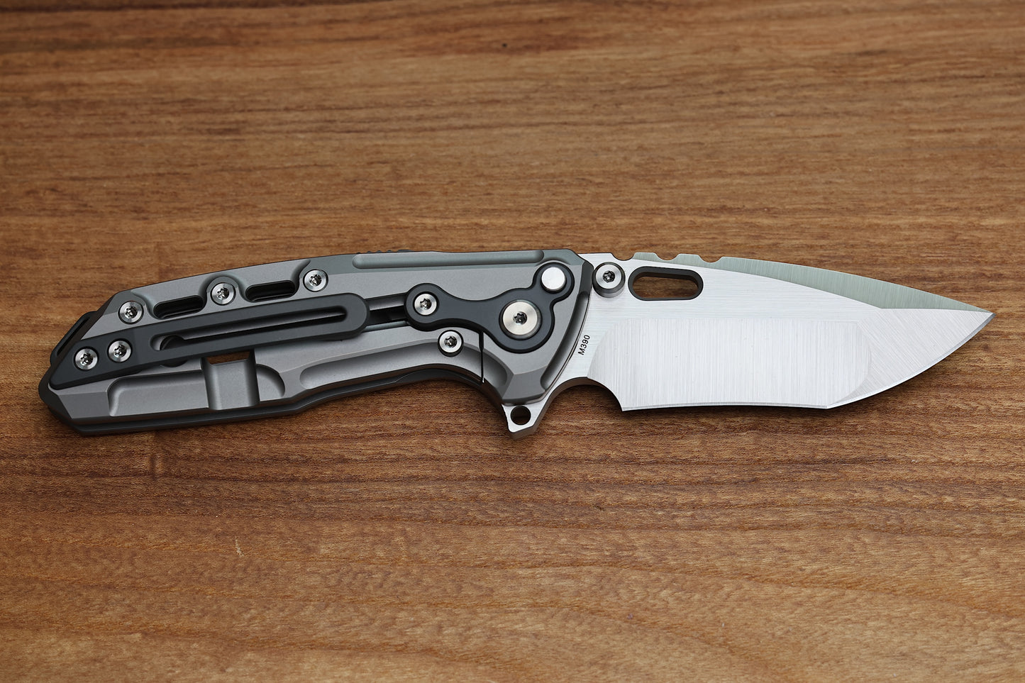 REATE T1000 V2 FLIPPER MILLED TITANIUM W/ ZIRCONIUM & RECURVE M390