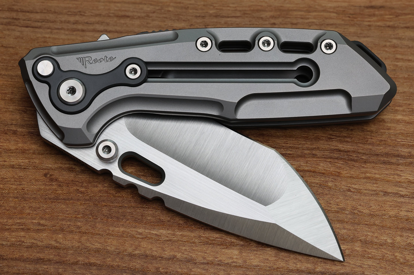 REATE T1000 V2 FLIPPER MILLED TITANIUM W/ ZIRCONIUM & RECURVE M390