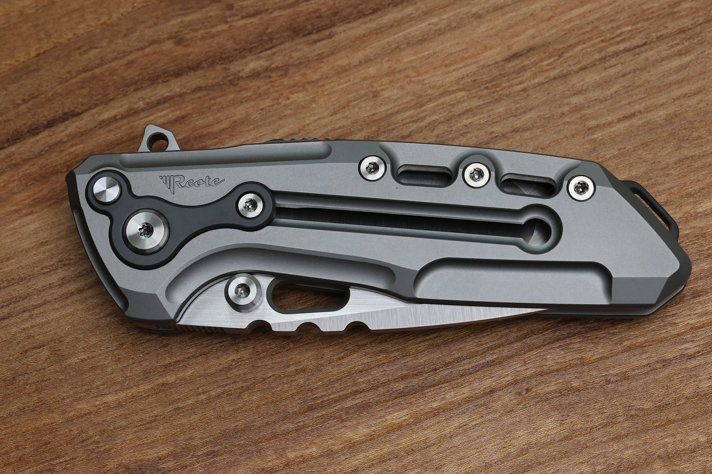 REATE T1000 V2 FLIPPER MILLED TITANIUM W/ ZIRCONIUM & RECURVE M390