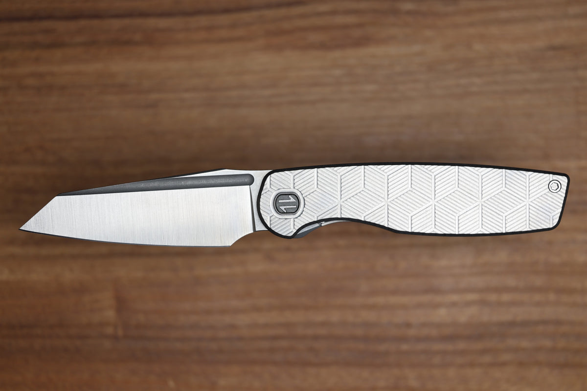 BROWN KNIVES CORTEX XL MILLED PATTERN TITANIUM AND HOLLOW GROUND SATIN MAGNACUT BLADE #414 (PREOWNED)