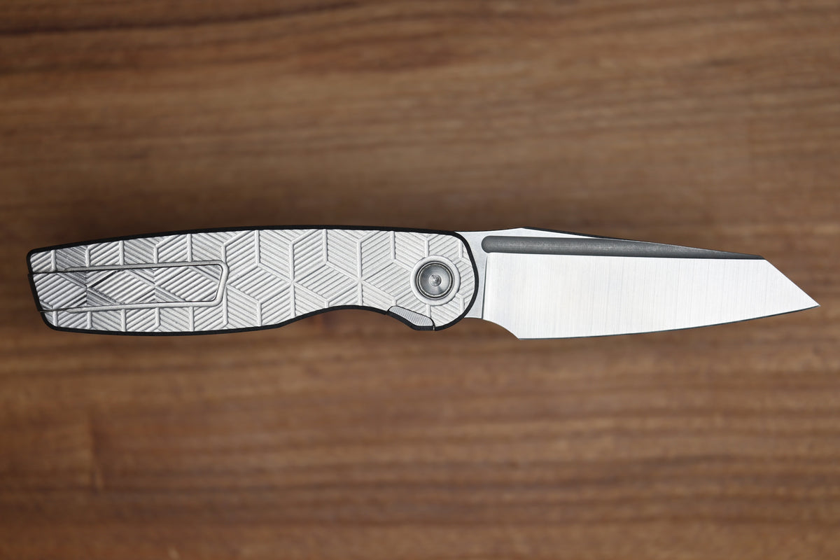 BROWN KNIVES CORTEX XL MILLED PATTERN TITANIUM AND HOLLOW GROUND SATIN MAGNACUT BLADE #414 (PREOWNED)