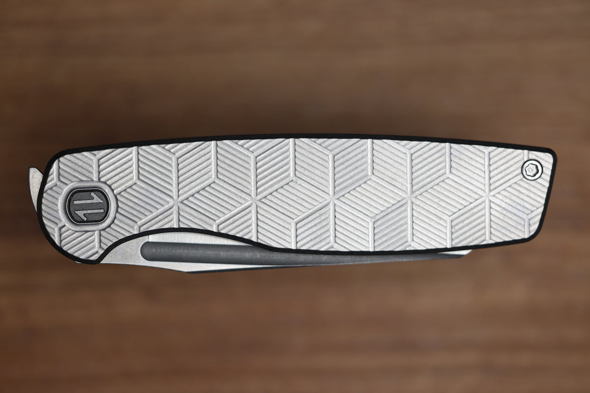 BROWN KNIVES CORTEX XL MILLED PATTERN TITANIUM AND HOLLOW GROUND SATIN MAGNACUT BLADE #414 (PREOWNED)