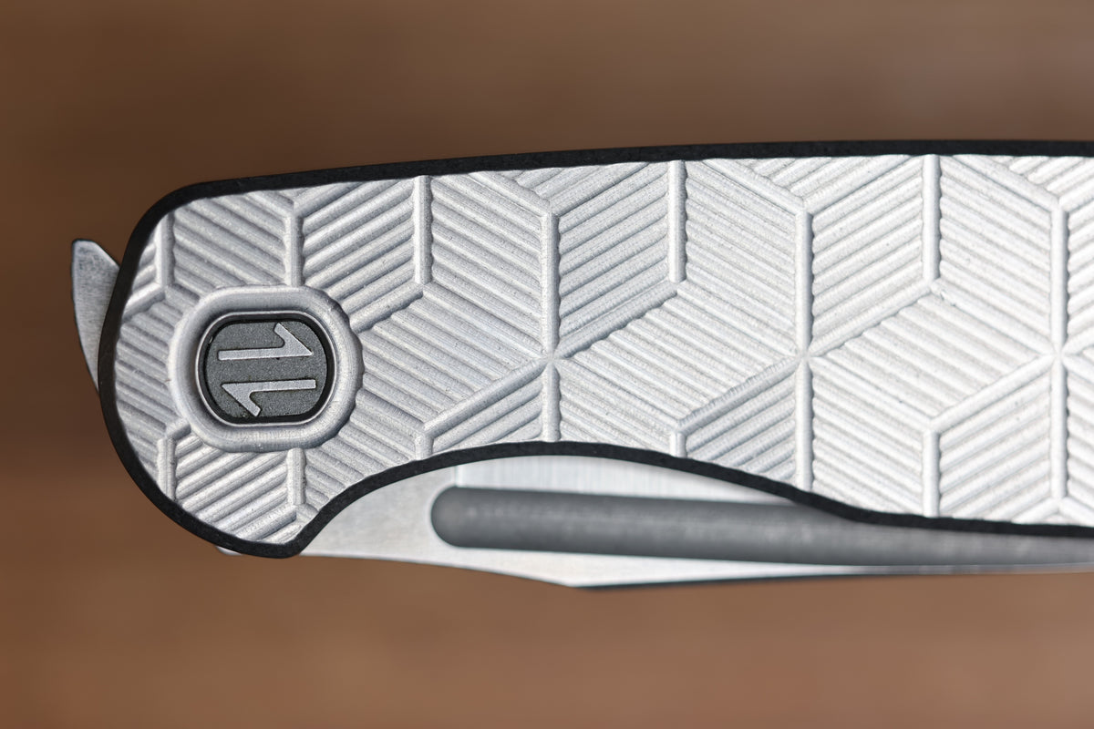 BROWN KNIVES CORTEX XL MILLED PATTERN TITANIUM AND HOLLOW GROUND SATIN MAGNACUT BLADE #414 (PREOWNED)