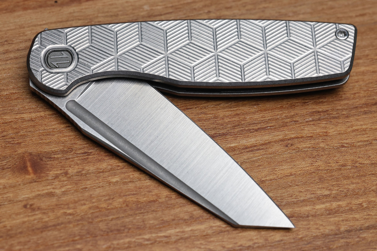 BROWN KNIVES CORTEX XL MILLED PATTERN TITANIUM AND HOLLOW GROUND SATIN MAGNACUT BLADE #414 (PREOWNED)