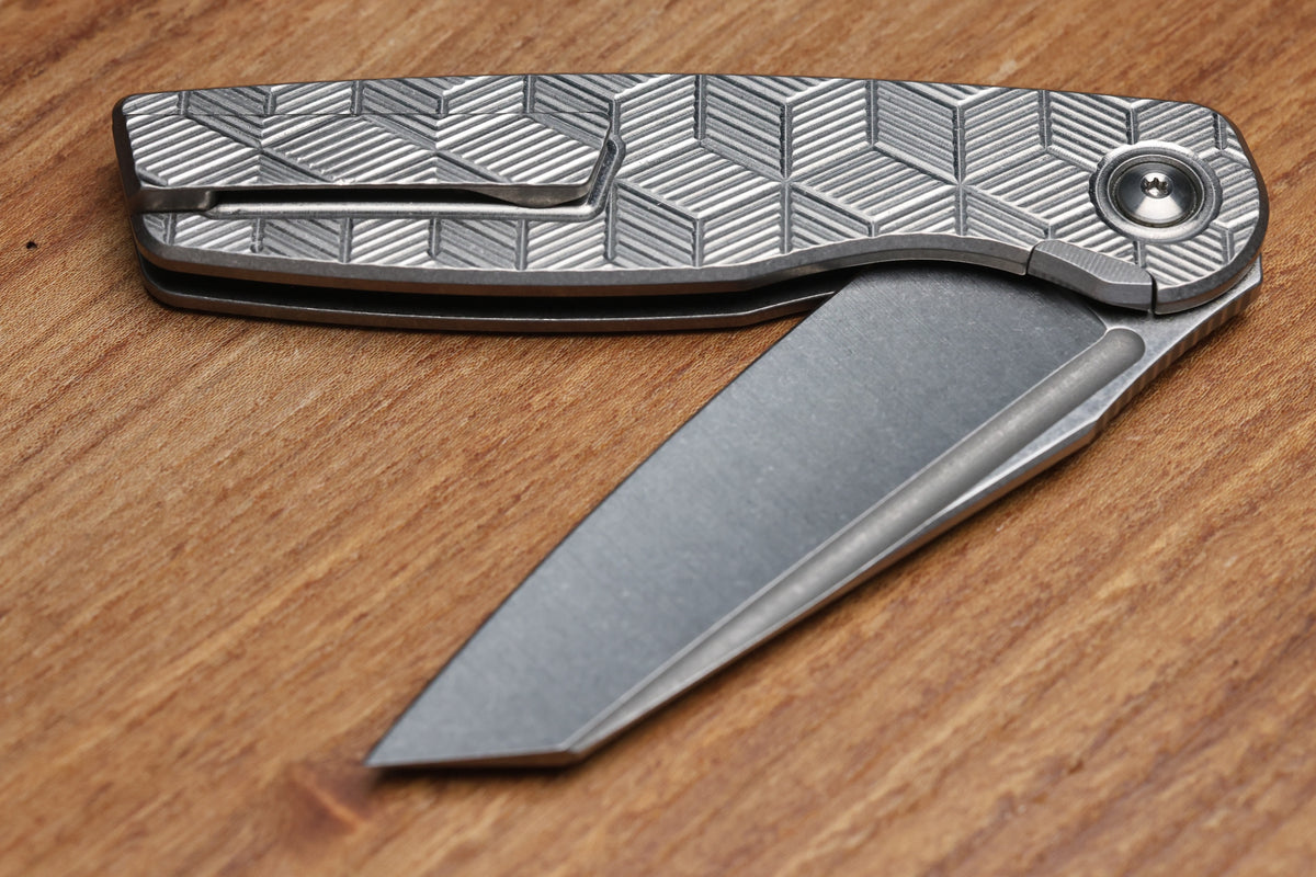 BROWN KNIVES CORTEX XL MILLED PATTERN TITANIUM AND HOLLOW GROUND SATIN MAGNACUT BLADE #414 (PREOWNED)