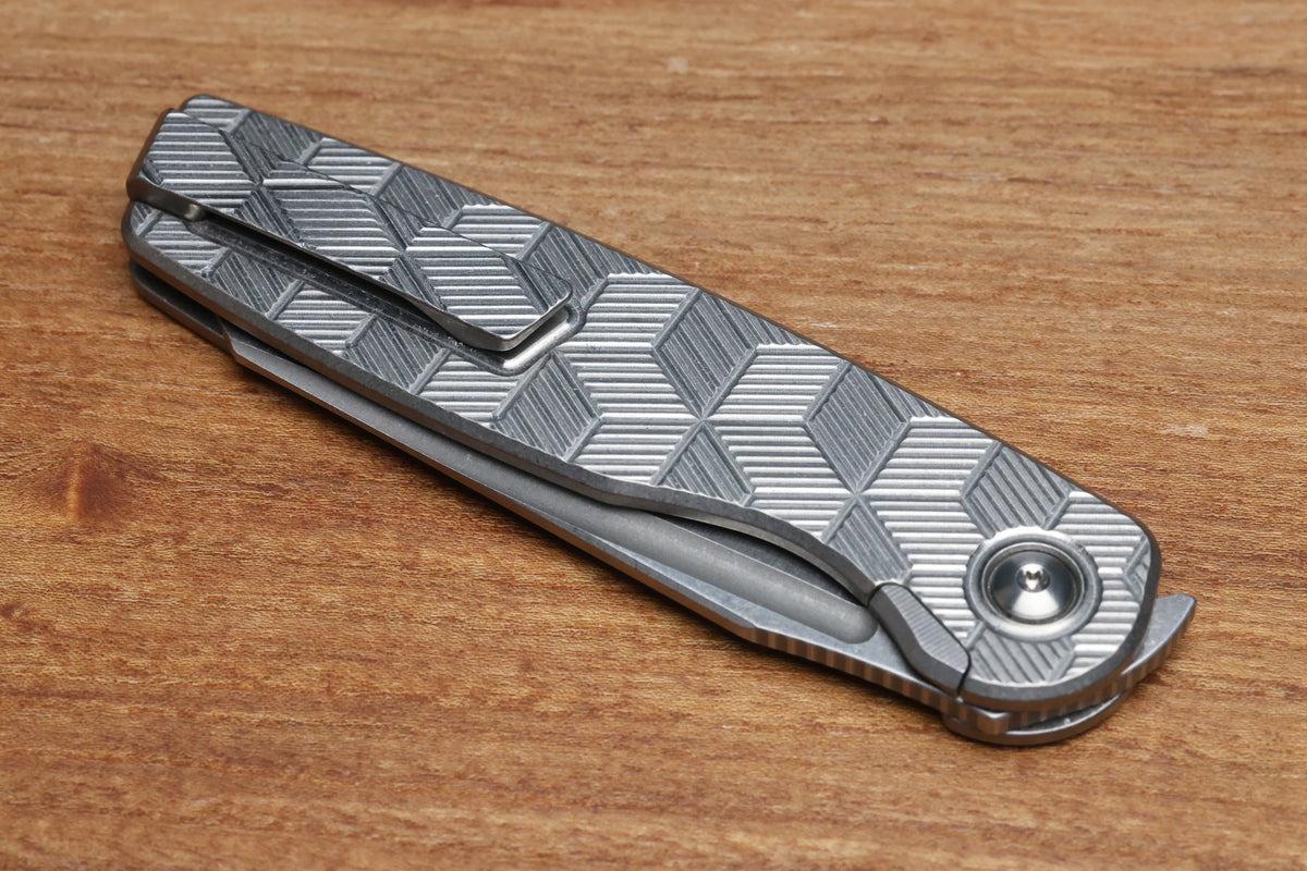 BROWN KNIVES CORTEX XL MILLED PATTERN TITANIUM AND HOLLOW GROUND SATIN MAGNACUT BLADE #414 (PREOWNED)
