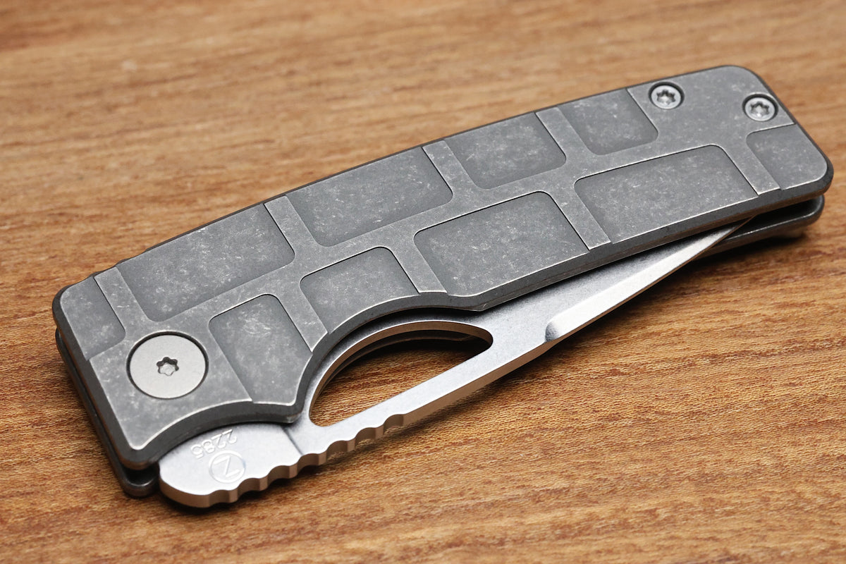 OZ MACHINE COMPANY ROOSEVELT MAG MILLED TITANIUM MAGNACUT BLADE #2285 (PREOWNED)