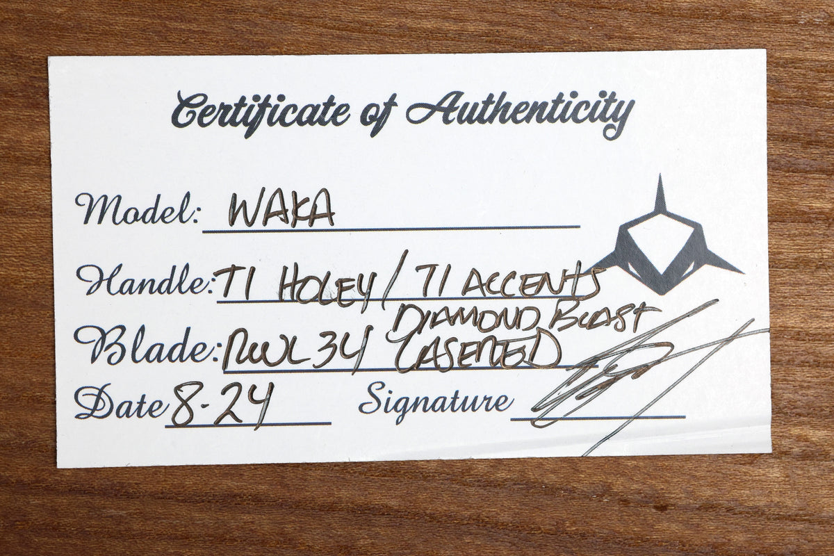 SHARKNIVCO WAKA DIAMOND BLAST TITANIUM FRAMELOCK HOLEY PATTERN RWL34 LASER ETCHED BLADE (PREOWNED)