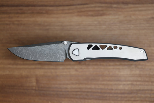SHARKNIVCO WAKA DIAMOND BLAST TITANIUM FRAMELOCK HOLEY PATTERN RWL34 LASER ETCHED BLADE (PREOWNED)