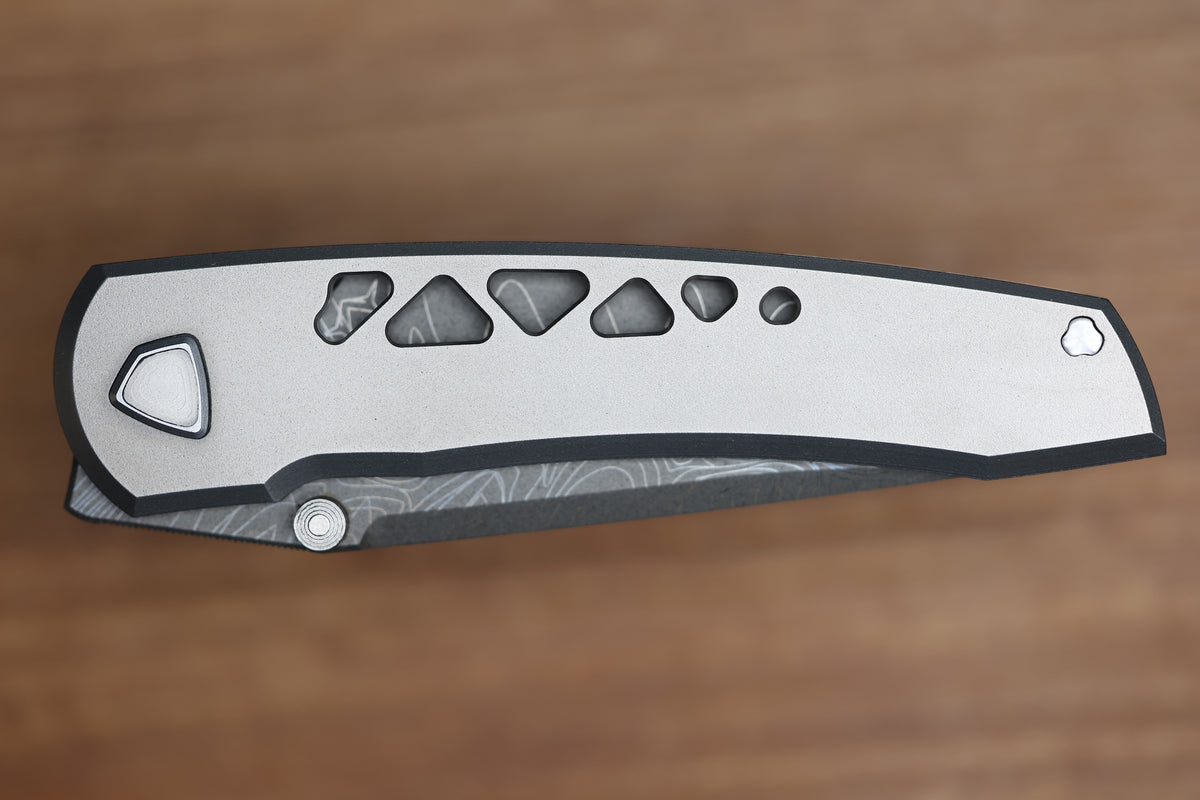SHARKNIVCO WAKA DIAMOND BLAST TITANIUM FRAMELOCK HOLEY PATTERN RWL34 LASER ETCHED BLADE (PREOWNED)