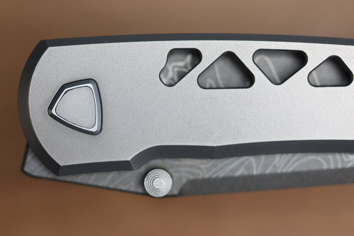 SHARKNIVCO WAKA DIAMOND BLAST TITANIUM FRAMELOCK HOLEY PATTERN RWL34 LASER ETCHED BLADE (PREOWNED)