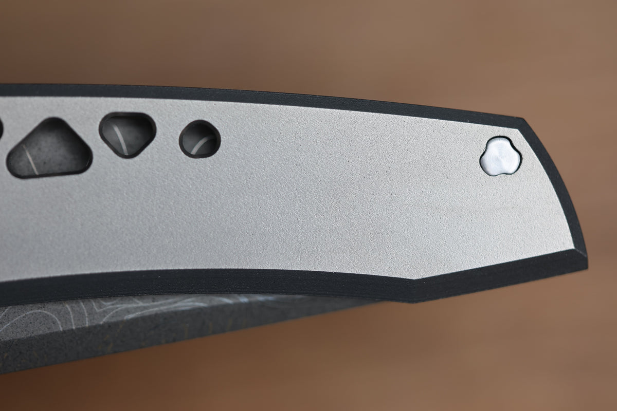 SHARKNIVCO WAKA DIAMOND BLAST TITANIUM FRAMELOCK HOLEY PATTERN RWL34 LASER ETCHED BLADE (PREOWNED)