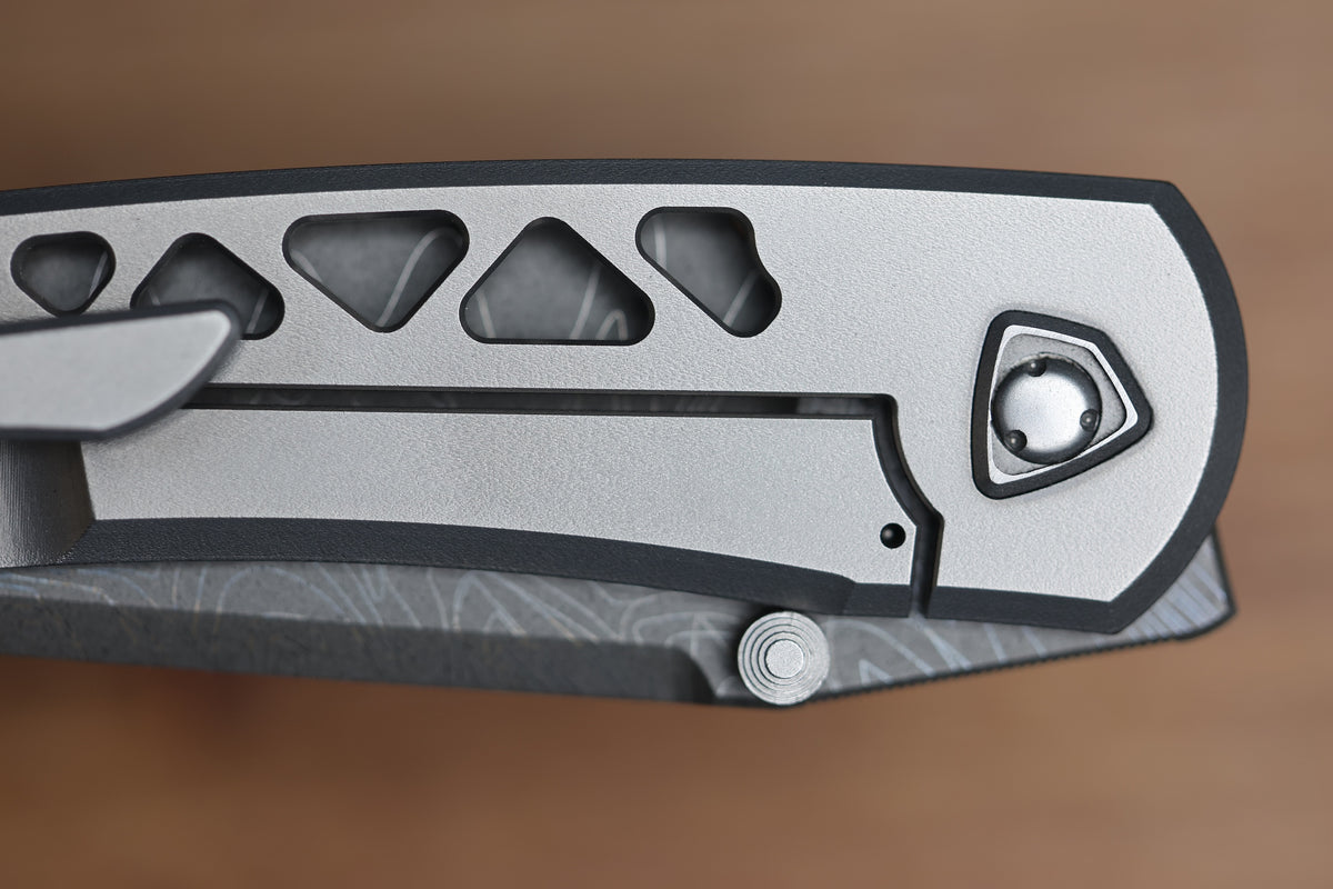 SHARKNIVCO WAKA DIAMOND BLAST TITANIUM FRAMELOCK HOLEY PATTERN RWL34 LASER ETCHED BLADE (PREOWNED)
