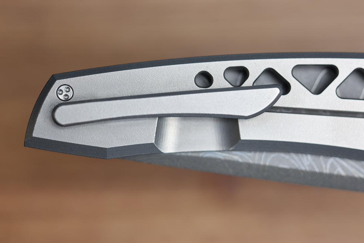 SHARKNIVCO WAKA DIAMOND BLAST TITANIUM FRAMELOCK HOLEY PATTERN RWL34 LASER ETCHED BLADE (PREOWNED)