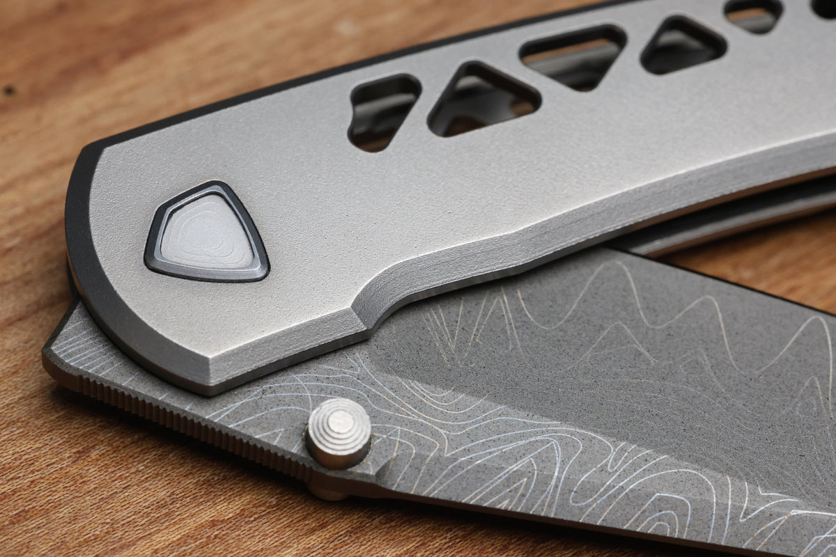 SHARKNIVCO WAKA DIAMOND BLAST TITANIUM FRAMELOCK HOLEY PATTERN RWL34 LASER ETCHED BLADE (PREOWNED)