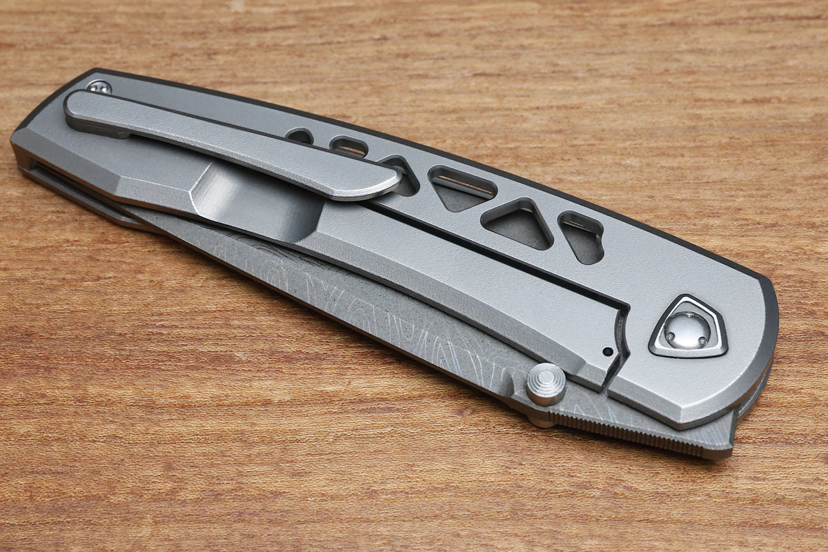SHARKNIVCO WAKA DIAMOND BLAST TITANIUM FRAMELOCK HOLEY PATTERN RWL34 LASER ETCHED BLADE (PREOWNED)
