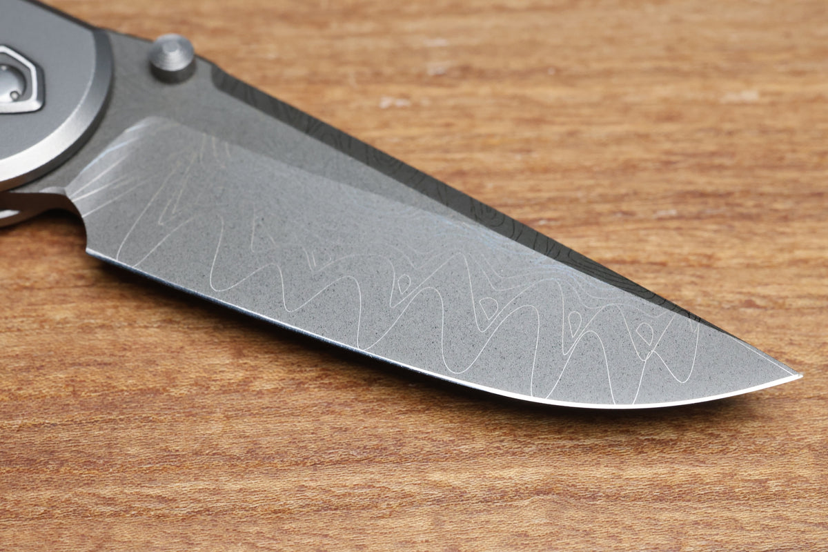 SHARKNIVCO WAKA DIAMOND BLAST TITANIUM FRAMELOCK HOLEY PATTERN RWL34 LASER ETCHED BLADE (PREOWNED)