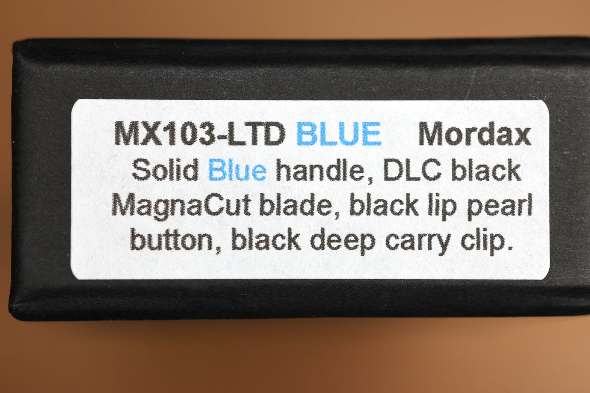 PRO-TECH MORDAX BLUE HANDLES W/ BLACK LIP PEARL BUTTON & DLC MAGNACUT MX103-LTD BLUE