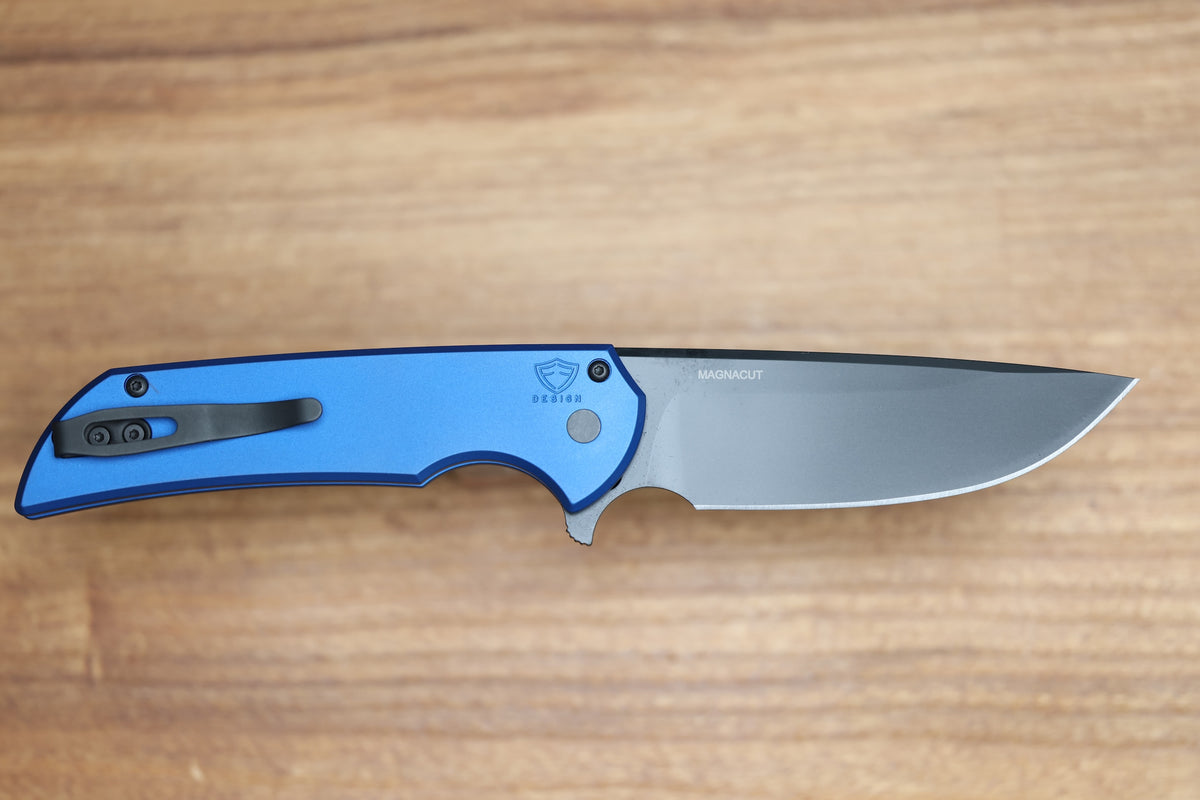 PRO-TECH MORDAX BLUE HANDLES W/ BLACK LIP PEARL BUTTON & DLC MAGNACUT MX103-LTD BLUE