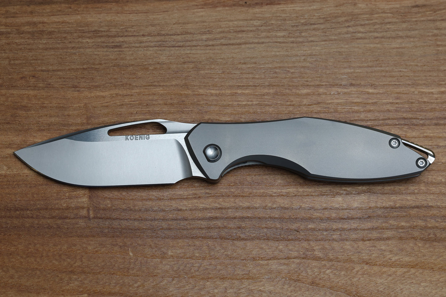 KOENIG KNIVES ARIUS - NON FLIPPER - SMOOTH TITANIUM HANDLE - SILVER HARDWARE - BURNISHED W/ POLISHED FLATS M390 BLADE