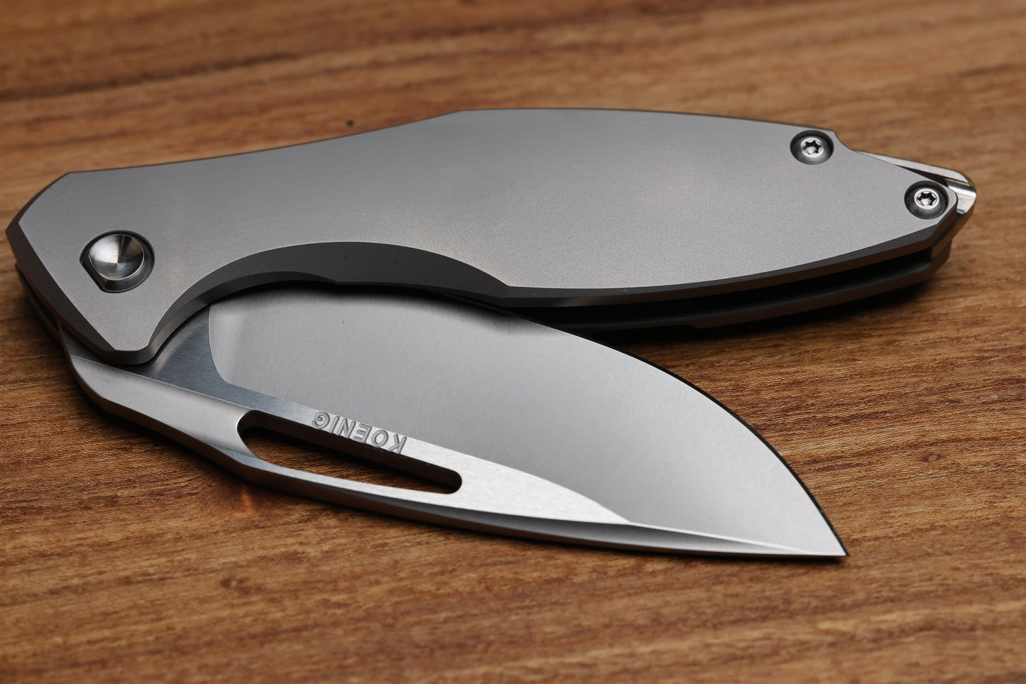 KOENIG KNIVES ARIUS - NON FLIPPER - SMOOTH TITANIUM HANDLE - SILVER HARDWARE - BURNISHED W/ POLISHED FLATS M390 BLADE