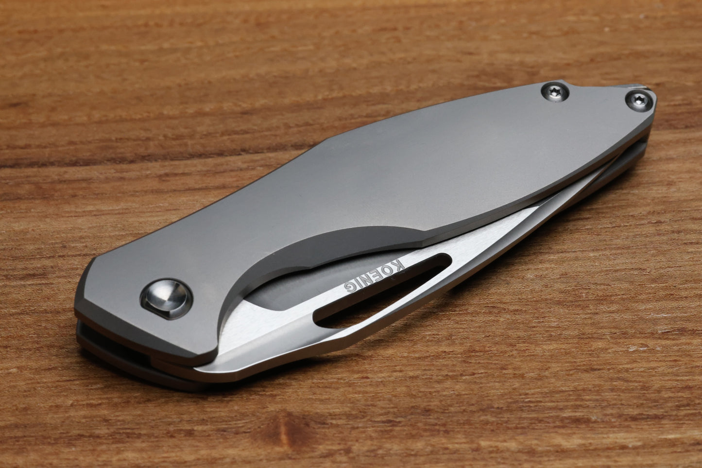 KOENIG KNIVES ARIUS - NON FLIPPER - SMOOTH TITANIUM HANDLE - SILVER HARDWARE - BURNISHED W/ POLISHED FLATS M390 BLADE