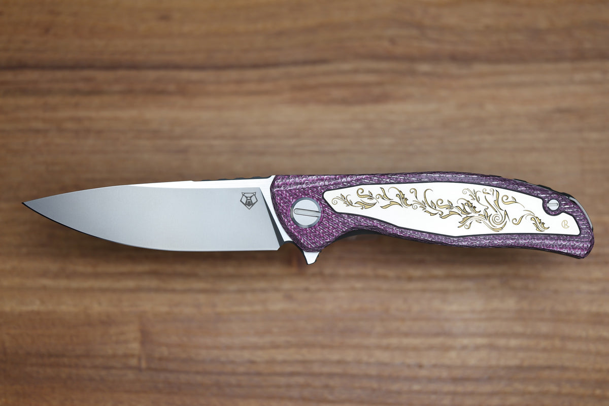 SHIROGOROV KNIVES AND CHRIS REEVE KNIVES COLLABORATION HATI CGG - MAGNACUT BLADE - TITANIUM/PURPLE ALUTEX HANDLE - MRBS