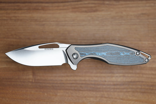 KOENIG KNIVES ARIUS - SMOOTH TITANIUM HANDLE W/ OCEAN BLUE CARBOTI INLAYS - SILVER HARDWARE - BRIGHTWASHED W/ POLISHED FLATS M390 BLADE
