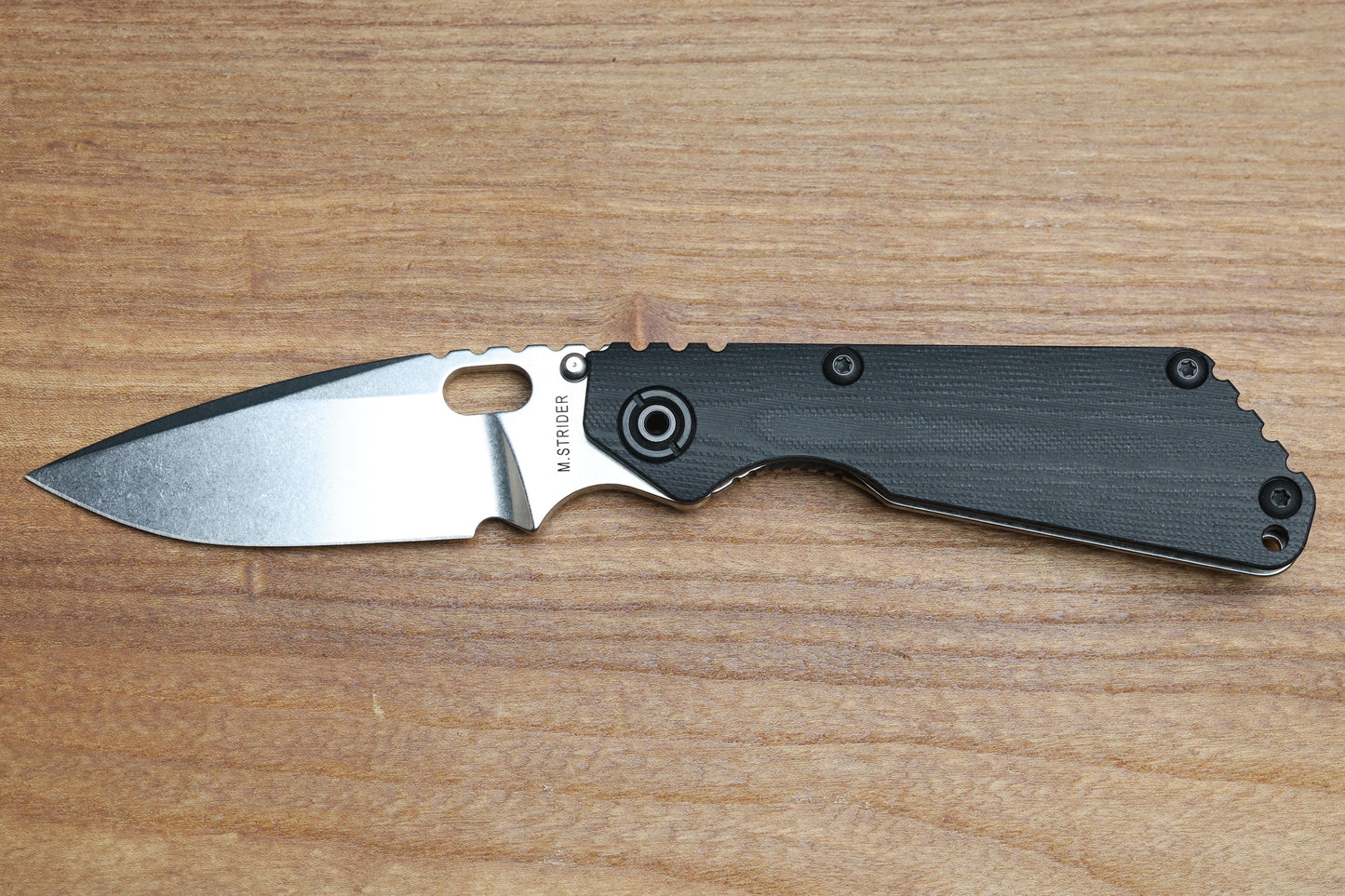 STRIDER KNIVES SNG CC - TITANIUM/BLACK G10 HANDLE - DROP POINT MAGNACUT BLADE