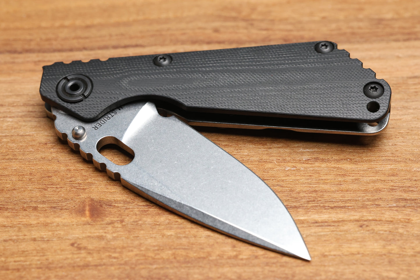 STRIDER KNIVES SNG CC - TITANIUM/BLACK G10 HANDLE - DROP POINT MAGNACUT BLADE