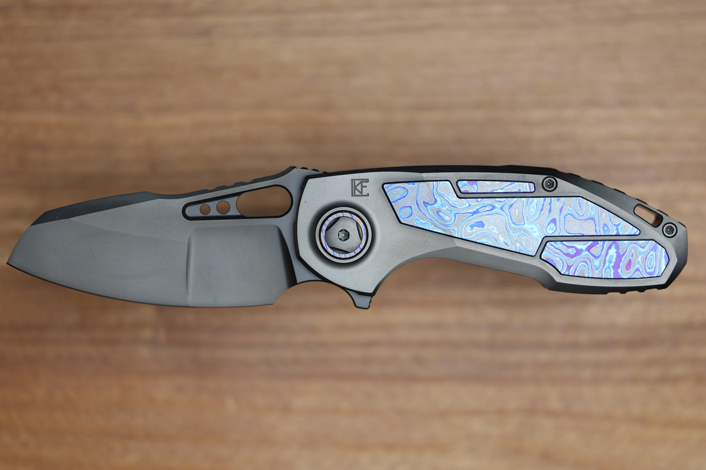 CUSTOM KNIFE FACTORY PEACEDUKE 2.0 DLC TITANIUM W/ZIRCUTI INSERTS M398 BLADE