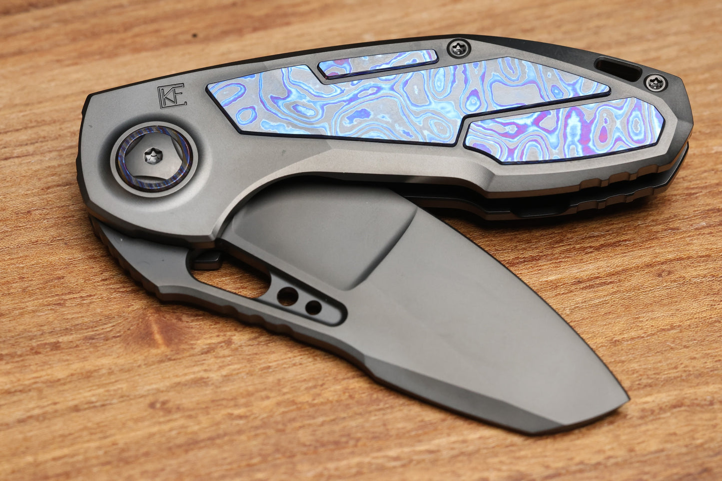 CUSTOM KNIFE FACTORY PEACEDUKE 2.0 DLC TITANIUM W/ZIRCUTI INSERTS M398 BLADE
