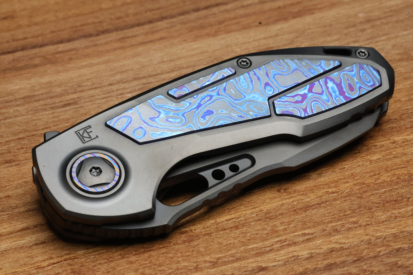 CUSTOM KNIFE FACTORY PEACEDUKE 2.0 DLC TITANIUM W/ZIRCUTI INSERTS M398 BLADE